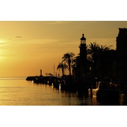 Coucher de soleil sur le phare du Grau du Roi